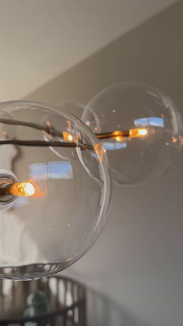 Hanglamp glazen bollen eettafel goud